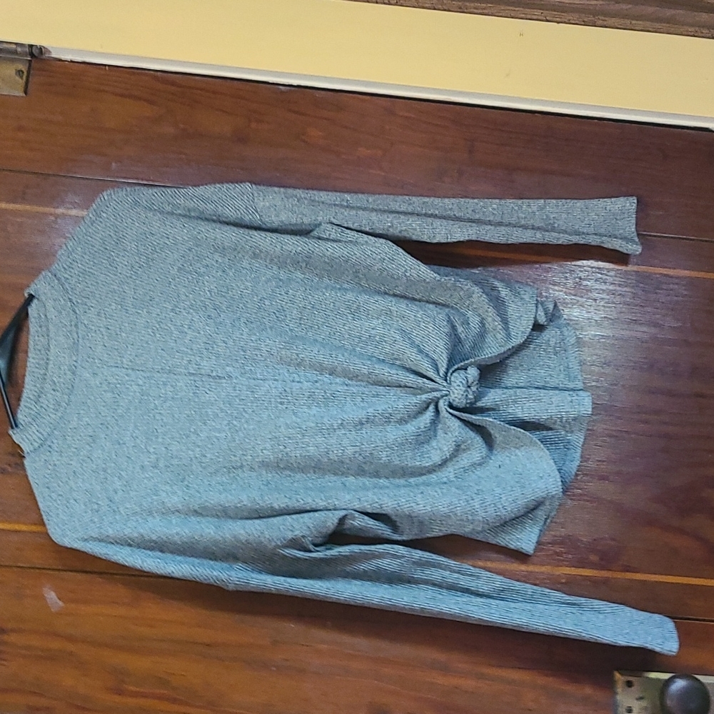 A mock neck sweater